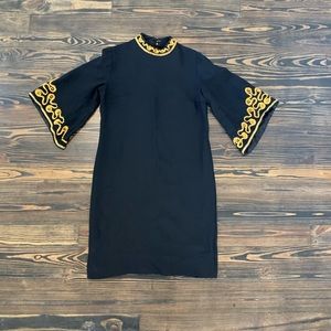 Vintage black crepe cocktail dress.
